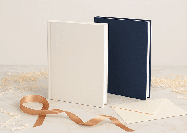 A pair of blank books on display