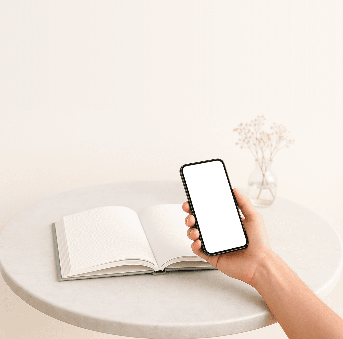 smartphone with a blank page hovering over a blank book